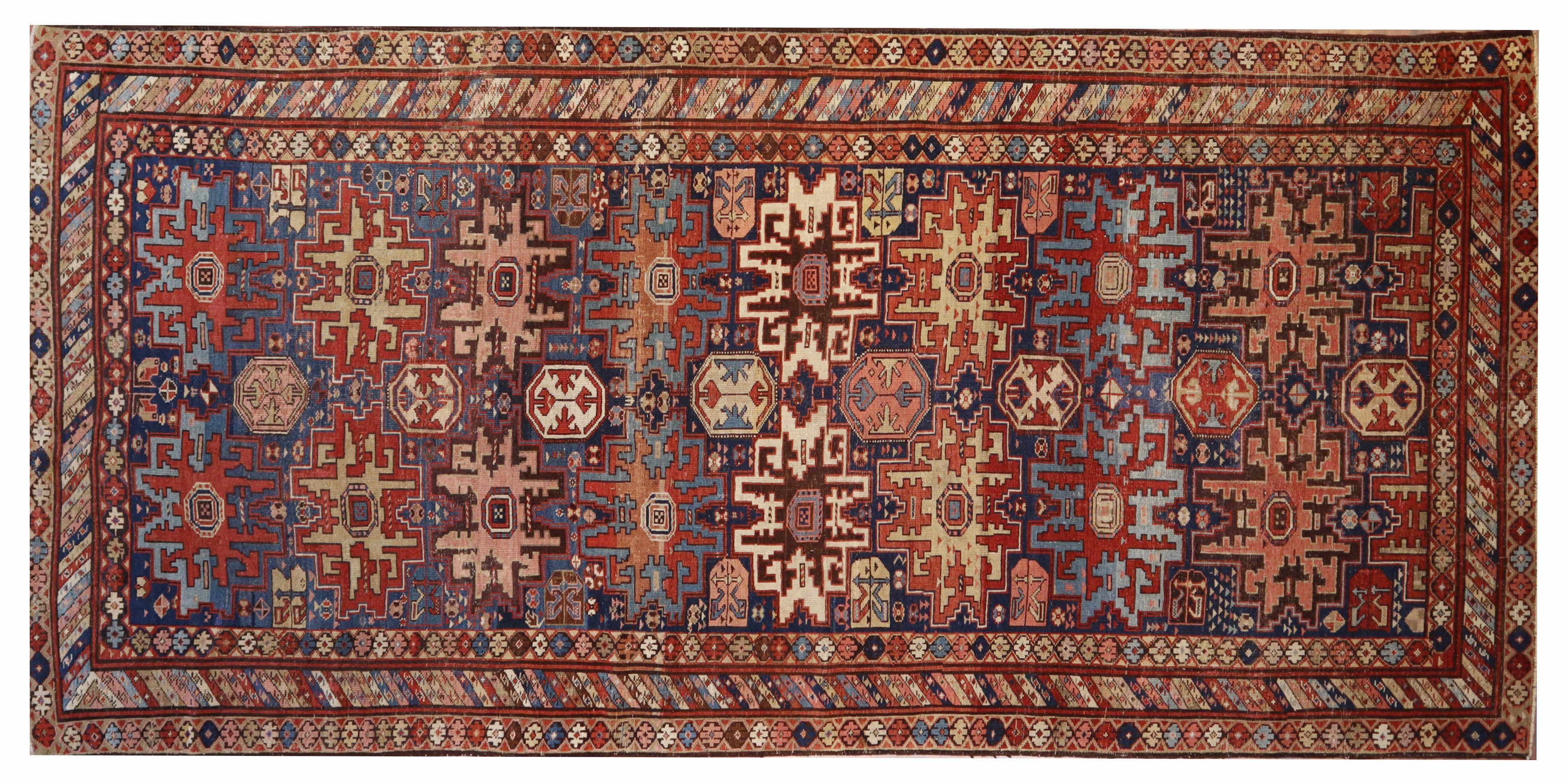 Geometric Caucasus rug, 5'3" x 11'3", from Afghanistan
